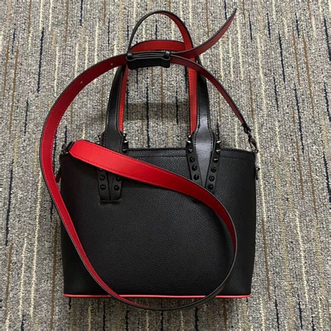 christian louboutin backpack fake